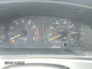 ✅ 1995 Toyota Camry LE • VIN: JT2SK12E8S0323032 • Lot: 32940318. Wystawiony na IAAI z przebiegiem 244 816 mil. Bezpłatny archiwum sprzedaży aukcyjnych z USA i szczegółowy raport historii pojazdu na DreamBid. Zdjęcie 7.