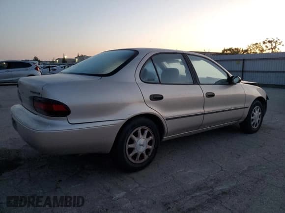 ✅ 1994 Geo Prizm • VIN: 1Y1SK5382RZ047889 • Lot: 51683725. Listed on Copart with 149,793 mi. Free auction sales archive from the USA and detailed vehicle history report at DreamBid. Image 3.