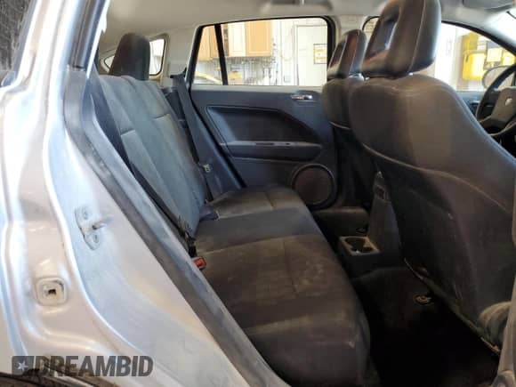 2008 Dodge Caliber SE z VIN 1B3HB28BX8D795479, wystawiony jako Copart lot #67142614 z przebiegiem 123 620 mil mil oraz Szkoda całkowita • Salvage title. Historia ofert i sprzedaży dostępna na DreamBid. Obrazek 11.