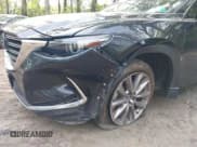 ✅ 2023 Mazda CX-9 Carbon Edition • VIN: JM3TCBDY7P0630082 • Lot: 42930948. Wystawiony na IAAI z przebiegiem 65 592 mil. Bezpłatny archiwum sprzedaży aukcyjnych z USA i szczegółowy raport historii pojazdu na DreamBid. Zdjęcie 6.