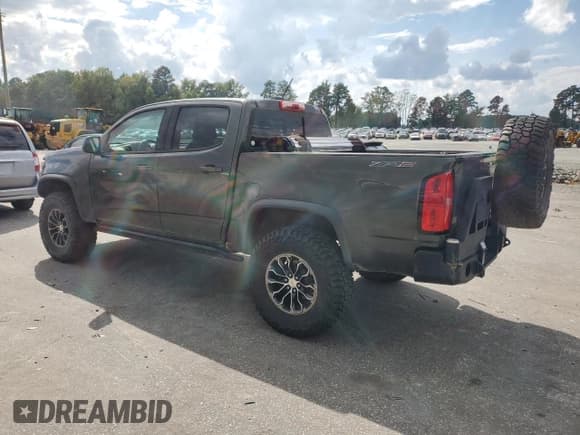 ✅ 2017 Chevrolet Colorado 4WD ZR2 • VIN: 1GCGTEEN0H1311246 • Лот: 72078584. Опубликован ранее на Copart с пробегом 119 678 миль. Бесплатный доступ к архиву аукционных продаж из США и подробный отчёт об истории автомобиля на DreamBid. Изображение 2.