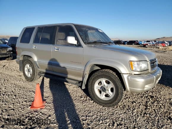 ✅ 1999 Isuzu Trooper S • VIN: JACDJ58X1X7931474 • Lot: 80273494. Listed on Copart with 295,128 mi. Free auction sales archive from the USA and detailed vehicle history report at DreamBid. Image 4.