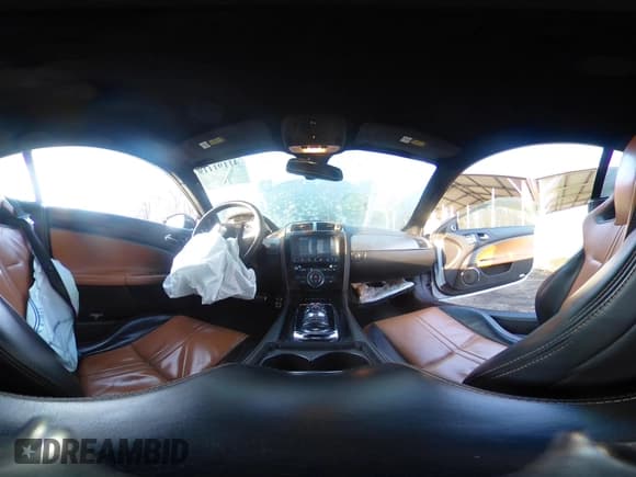 ✅ 2014 Jaguar XK XKR • VIN: SAJWA4DC7EMB52199 • Lot: 41191119. Listed on IAAI with 90,585 mi. Free auction sales archive from the USA and detailed vehicle history report at DreamBid. Image 18.