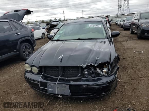 ✅ 2004 Jaguar X-Type • VIN: SAJEA51C24WE08340 • Lot: 82683605. Listed on Copart with 202,758 mi. Free auction sales archive from the USA and detailed vehicle history report at DreamBid. Image 5.