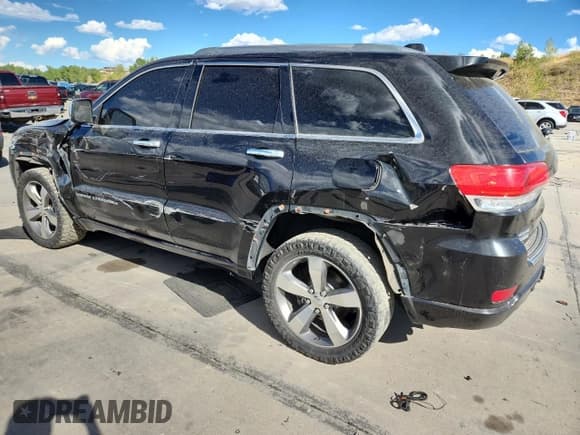 ✅ 2015 Jeep Grand Cherokee Overland • VIN: 1C4RJFCM9FC762451 • Lot: 80275465. Listed on Copart with 138,061 mi. Free auction sales archive from the USA and detailed vehicle history report at DreamBid. Image 2.