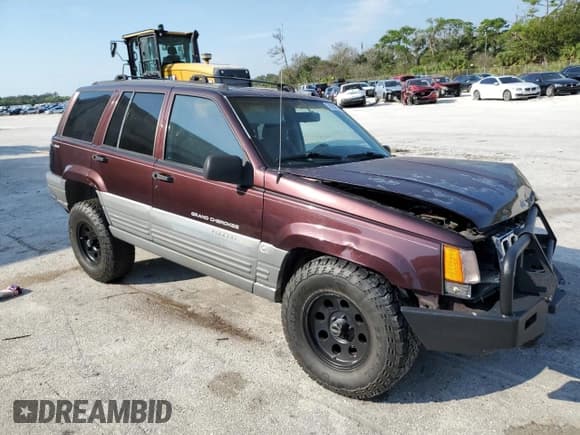 ✅ 1997 Jeep Grand Cherokee Laredo • VIN: 1J4GZ58S5VC688455 • Лот: 74294204. Опубликован ранее на Copart с пробегом 135 143 миль. Бесплатный доступ к архиву аукционных продаж из США и подробный отчёт об истории автомобиля на DreamBid. Изображение 4.