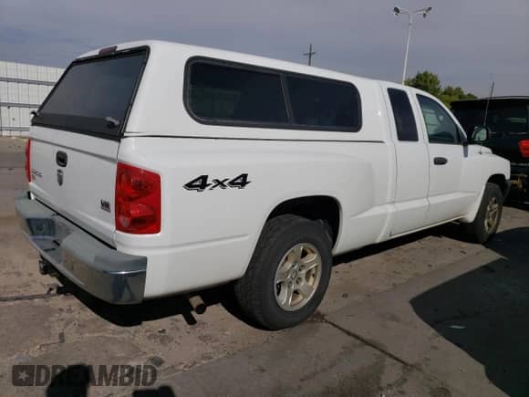 2005 Dodge Dakota SLT с VIN 1D7HW42N15S346853, выставлен на аукционе Copart как лот 75860094 с пробегом 182 727 миль миль и Списание • Salvage title. История ставок и продаж доступна на DreamBid. Изображение 3.
