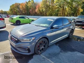 ✅ 2021 Volkswagen Jetta S • VIN: 3VW6T7BU2MM034595 • Lot: 82676125. Listed on Copart with 150,559 mi. Free auction sales archive from the USA and detailed vehicle history report at DreamBid. Image 1.