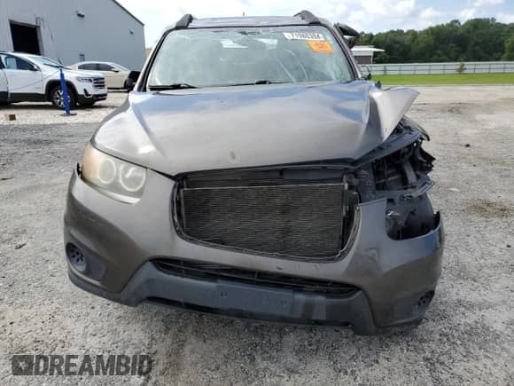 2012 Hyundai Santa Fe GLS с VIN 5XYZG3AB7CG145877, выставлен на аукционе Copart как лот 71986394 с пробегом Не указан миль и На запчасти • Non repairable. История ставок и продаж доступна на DreamBid. Изображение 5.