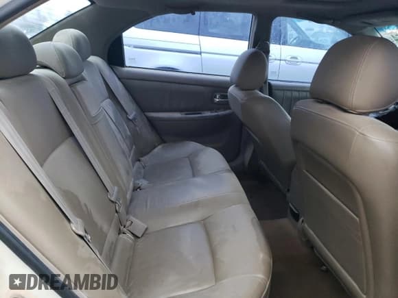 ✅ 2004 Kia Optima LX • VIN: KNAGD128745329120 • Лот: 82915464. Опубликован ранее на Copart с пробегом 167 112 миль. Бесплатный доступ к архиву аукционных продаж из США и подробный отчёт об истории автомобиля на DreamBid. Изображение 10.
