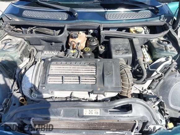 ✅ 2005 MINI Convertible S • VIN: WMWRH33575TK55935 • Lot: 42929744. Wystawiony na IAAI z przebiegiem 126 140 mil. Bezpłatny archiwum sprzedaży aukcyjnych z USA i szczegółowy raport historii pojazdu na DreamBid. Zdjęcie 10.