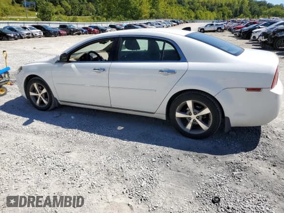 ✅ 2012 Chevrolet Malibu 1LT • VIN: 1G1ZC5E02CF211828 • Lot: 70133244. Listed on Copart with 115,572 mi. Free auction sales archive from the USA and detailed vehicle history report at DreamBid. Image 2.