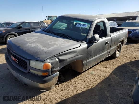 2002 GMC Sierra 1500 z VIN 1GTEC14W92Z280310, wystawiony jako Copart lot #74731204 z przebiegiem 241 075 mil mil oraz Szkoda całkowita • Salvage title. Historia ofert i sprzedaży dostępna na DreamBid. Obrazek 1.