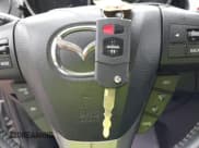 ✅ 2012 Mazda 3 i Touring • VIN: JM1BL1V84C1693996 • Lot: 43225641. Listed on IAAI with 125,243 mi. Free auction sales archive from the USA and detailed vehicle history report at DreamBid. Image 11.