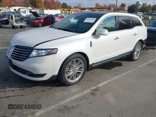 ✅ 2019 Lincoln MKT Reserve • VIN: 2LMHJ5AT2KBL00694 • Lot: 43639684. Listed on IAAI with 121,171 mi. Free auction sales archive from the USA and detailed vehicle history report at DreamBid. Image 2.