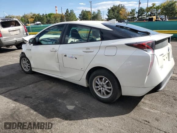 ✅ 2016 Toyota Prius Two • VIN: JTDKBRFU0G3001112 • Lot: 84916145. Listed on Copart with 105,013 mi. Free auction sales archive from the USA and detailed vehicle history report at DreamBid. Image 2.