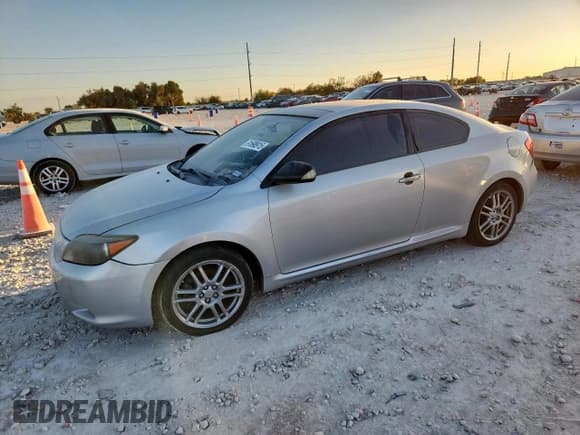 ✅ 2007 Scion tC • VIN: JTKDE167170195641 • Лот: 91698915. Опубликован ранее на Copart с пробегом 202 464 миль. Бесплатный доступ к архиву аукционных продаж из США и подробный отчёт об истории автомобиля на DreamBid. Изображение 1.