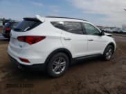 ✅ 2018 Hyundai Santa Fe 2.4L • VIN: 5NMZUDLB3JH065765 • Lot: 48708024. Wystawiony na Copart z przebiegiem 67 727 mil. Bezpłatny archiwum sprzedaży aukcyjnych z USA i szczegółowy raport historii pojazdu na DreamBid. Zdjęcie 3.