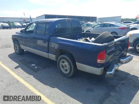 ✅ 2000 Dodge Dakota Sport • VIN: 1B7GL2AX8YS783520 • Lot: 43277615. Listed on IAAI with 303,682 mi. Free auction sales archive from the USA and detailed vehicle history report at DreamBid. Image 3.