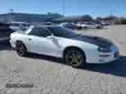 2002 Chevrolet Camaro Z28 z VIN 2G1FP22G922146192, wystawiony jako Copart lot #87924525 z przebiegiem 151 770 mil mil oraz Szkoda całkowita • Salvage title. Historia ofert i sprzedaży dostępna na DreamBid. Obrazek 4.