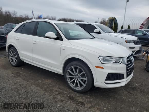 ✅ 2018 Audi Q3 Premium • VIN: WA1ECCFSXJR029780 • Lot: 92663745. Wystawiony na Copart z przebiegiem 139 158 mil. Bezpłatny archiwum sprzedaży aukcyjnych z USA i szczegółowy raport historii pojazdu na DreamBid. Zdjęcie 4.