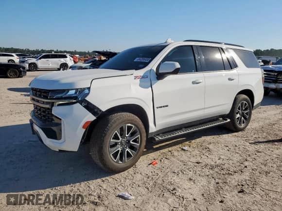 2022 Chevrolet Tahoe Z71 with VIN 1GNSKPKD4NR100687, listed as a Copart auction lot 84206455 with 63,741 mi miles and Salvage title. Bid and sale history available at DreamBid. Image 1.