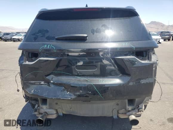 2018 Chevrolet Traverse LS with VIN 1GNEVFKW8JJ119221, listed as a Copart auction lot 64135205 with 128,751 mi miles and Salvage title. Bid and sale history available at DreamBid. Image 6.