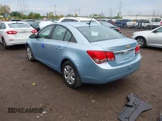 ✅ 2012 Chevrolet Cruze LS • VIN: 1G1PC5SH3C7150064 • Lot: 43308887. Listed on IAAI with 135,220 mi. Free auction sales archive from the USA and detailed vehicle history report at DreamBid. Image 3.