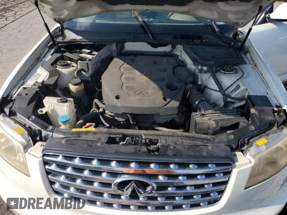 ✅ 2004 Infiniti FX • VIN: JNRAS08U04X100991 • Lot: 66007605. Listed on Copart with 166,977 mi. Free auction sales archive from the USA and detailed vehicle history report at DreamBid. Image 12.