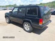 ✅ 2001 Jeep Cherokee Sport • VIN: 1J4FF58S21L557644 • Lot: 42665350. Listed on IAAI with 140,372 mi. Free auction sales archive from the USA and detailed vehicle history report at DreamBid. Image 3.