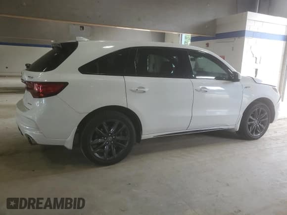 ✅ 2020 Acura MDX Technology • VIN: 5J8YD4H02LL010987 • Lot: 68427305. Listed on Copart with 104,336 mi. Free auction sales archive from the USA and detailed vehicle history report at DreamBid. Image 3.