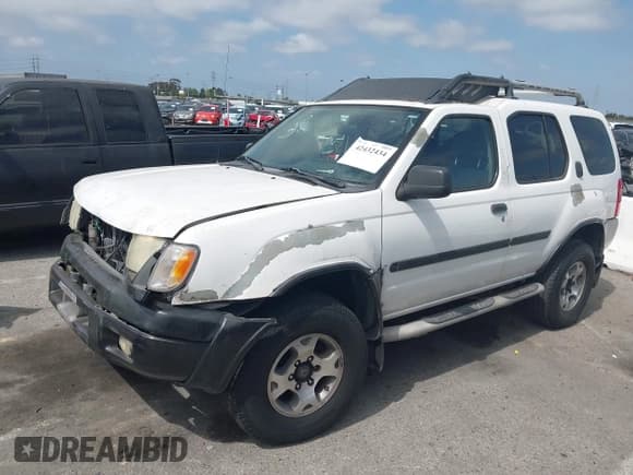 ✅ 2001 Nissan Xterra XE • VIN: 5N1ED28T01C520697 • Lot: 42432434. Listed on IAAI with 236,639 mi. Free auction sales archive from the USA and detailed vehicle history report at DreamBid. Image 2.
