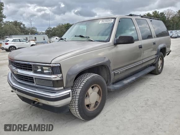✅ 1999 Chevrolet Suburban • VIN: 1GNFK16R5XJ387107 • Лот: 95286085. Опубликован ранее на Copart с пробегом 140 223 миль. Бесплатный доступ к архиву аукционных продаж из США и подробный отчёт об истории автомобиля на DreamBid. Изображение 1.