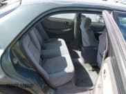 ✅ 1998 Mazda 626 DX • VIN: 1YVGF22C2W5691764 • Lot: 43677590. Wystawiony na IAAI z przebiegiem 142 191 mil. Bezpłatny archiwum sprzedaży aukcyjnych z USA i szczegółowy raport historii pojazdu na DreamBid. Zdjęcie 8.