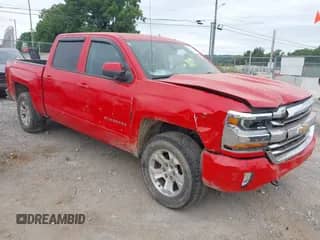 2016 Chevrolet Silverado 1500 LT z VIN 3GCUKREC3GG356502, wystawiony jako IAAI lot #42846450 z przebiegiem 148 955 mil mil oraz . Historia ofert i sprzedaży dostępna na DreamBid. Obrazek 1.