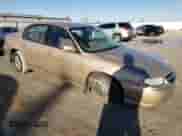 2001 Chevrolet Malibu LS with VIN 1G1NE52J016148358, listed as a Copart auction lot 84990314 with 93,424 mi miles and Salvage title. Bid and sale history available at DreamBid. Image 4.