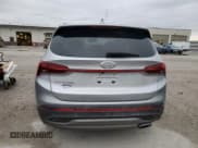 ✅ 2021 Hyundai Santa Fe SE • VIN: 5NMS14AJ6MH340926 • Lot: 51930555. Listed on Copart with 59,834 mi. Free auction sales archive from the USA and detailed vehicle history report at DreamBid. Image 6.