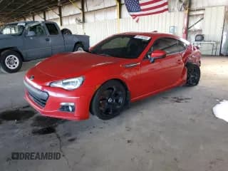 ✅ 2014 Subaru BRZ Limited • VIN: JF1ZCAC18E9600735 • Lot: 70719745. Listed on Copart with 124,632 mi. Free auction sales archive from the USA and detailed vehicle history report at DreamBid. Image 1.