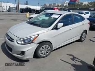 2015 Hyundai Accent GLS with VIN KMHCT4AE4FU936500, listed as a IAAI auction lot 43347520 with 143,412 mi miles and . Bid and sale history available at DreamBid. Image 2.