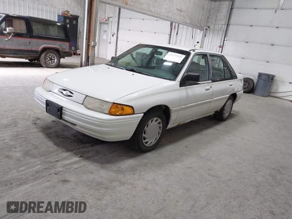 ✅ 1995 Ford Escort • VIN: 1FASP14J2SW297016 • Lot: 42579348. Listed on IAAI with 101,941 mi. Free auction sales archive from the USA and detailed vehicle history report at DreamBid. Image 2.