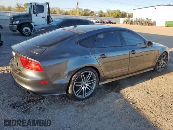 ✅ 2014 Audi A7 Prestige • VIN: WAU2GAFC5EN066000 • Лот: 91294725. Опубликован ранее на Copart с пробегом 140 438 миль. Бесплатный доступ к архиву аукционных продаж из США и подробный отчёт об истории автомобиля на DreamBid. Изображение 3.