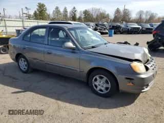 2005 Hyundai Accent GLS z VIN KMHCG45C65U625887, wystawiony jako Copart lot #48824225 z przebiegiem 110 594 mil mil oraz Szkoda całkowita • Salvage title. Historia ofert i sprzedaży dostępna na DreamBid. Obrazek 4.