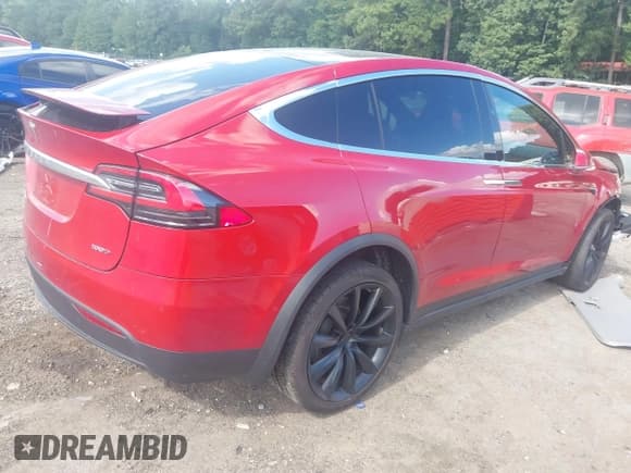 ✅ 2018 Tesla Model X 75D • VIN: 5YJXCBE20JF141228 • Lot: 42763899. Listed on IAAI with Not provided. Free auction sales archive from the USA and detailed vehicle history report at DreamBid. Image 4.