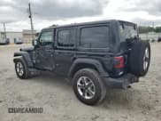 ✅ 2022 Jeep Wrangler Unlimited Sahara Altitude • VIN: 1C4HJXEG9NW189265 • Lot: 67490265. Listed on Copart with 29,661 mi. Free auction sales archive from the USA and detailed vehicle history report at DreamBid. Image 2.