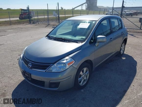 ✅ 2012 Nissan Versa S • VIN: 3N1BC1CP9CK801573 • Lot: 43251441. Listed on IAAI with 136,411 mi. Free auction sales archive from the USA and detailed vehicle history report at DreamBid. Image 2.