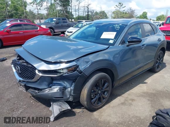 ✅ 2022 Mazda CX-30 S Carbon Edition • VIN: 3MVDMBCL9NM429826 • Lot: 42680808. Listed on IAAI with 28,234 mi. Free auction sales archive from the USA and detailed vehicle history report at DreamBid. Image 17.