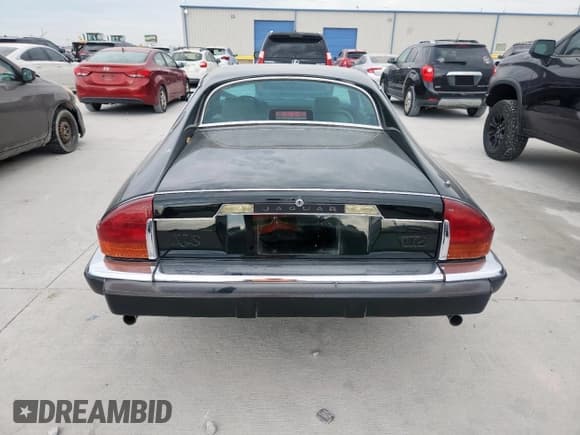 ✅ 1988 Jaguar XJS • VIN: SAJNA5846JC139624 • Лот: 67289765. Опубликован ранее на Copart с пробегом 136 205 миль. Бесплатный доступ к архиву аукционных продаж из США и подробный отчёт об истории автомобиля на DreamBid. Изображение 6.