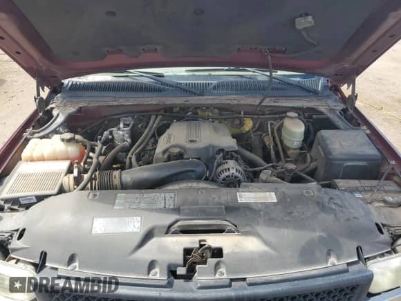 2002 Chevrolet Silverado 1500 with VIN 1GCJC33G92F215561, listed as a Copart auction lot 62516525 with 115,028 mi miles and Salvage title. Bid and sale history available at DreamBid. Image 11.