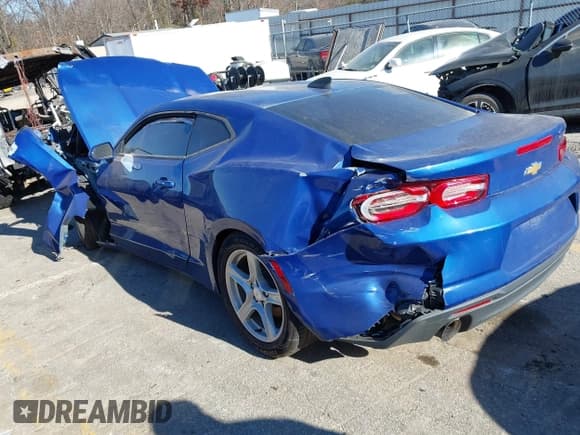 ✅ 2021 Chevrolet Camaro 1LS • VIN: 1G1FB1RX3M0128032 • Lot: 41050713. Listed on IAAI with 58,255 mi. Free auction sales archive from the USA and detailed vehicle history report at DreamBid. Image 3.