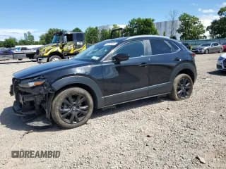 ✅ 2022 Mazda CX-30 2.5 Turbo • VIN: 3MVDMBAYXNM445872 • Lot: 65602655. Listed on Copart with 29,930 mi. Free auction sales archive from the USA and detailed vehicle history report at DreamBid. Image 1.